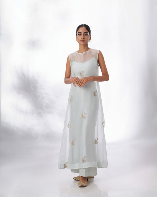 Model wearing the Spa Blue Silk Organza Butta Set by Kpret by Kalakaari