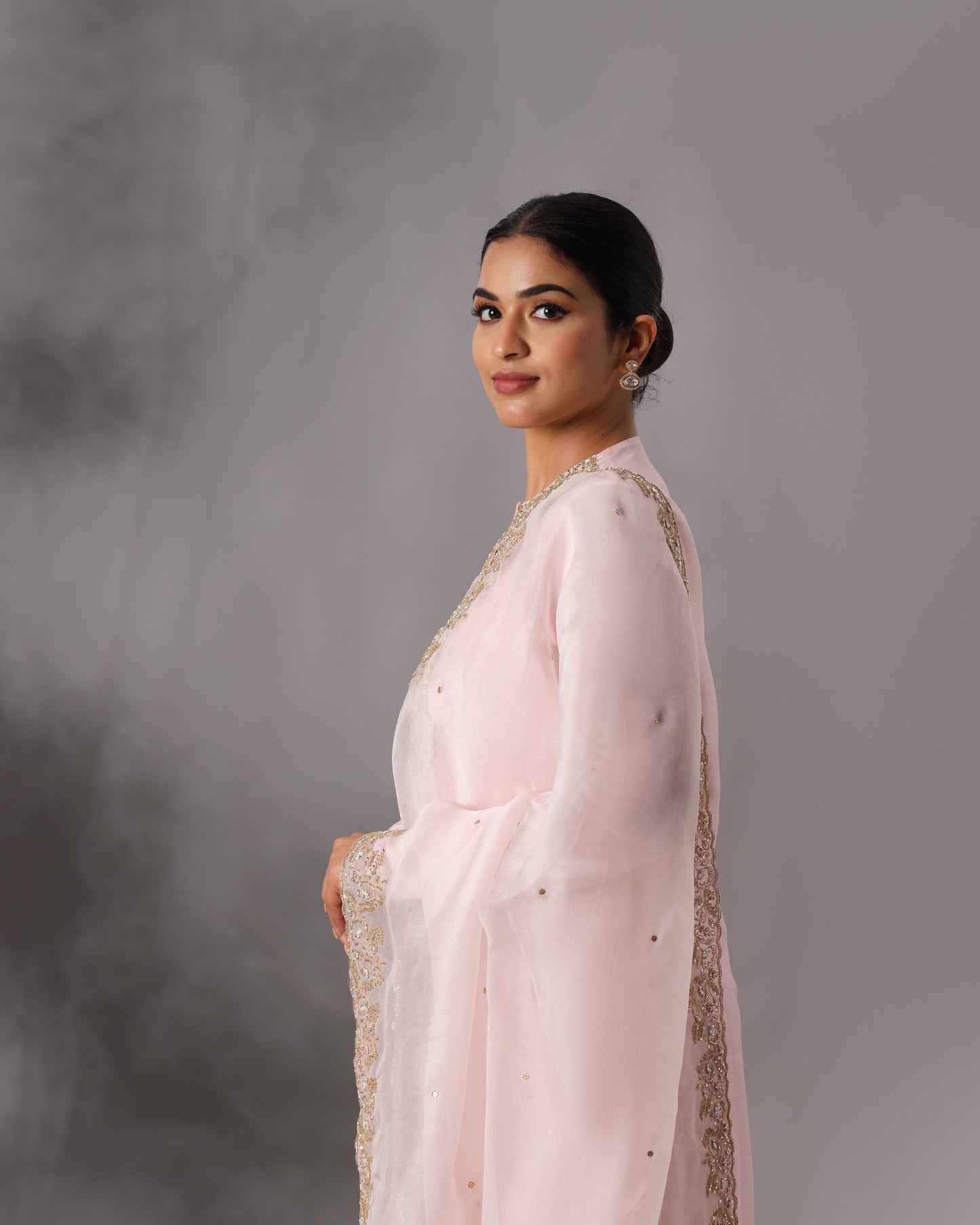 Model wearing the Powder Pink Hand-Embroidered Salwar Set by Kpret by Kalakaari