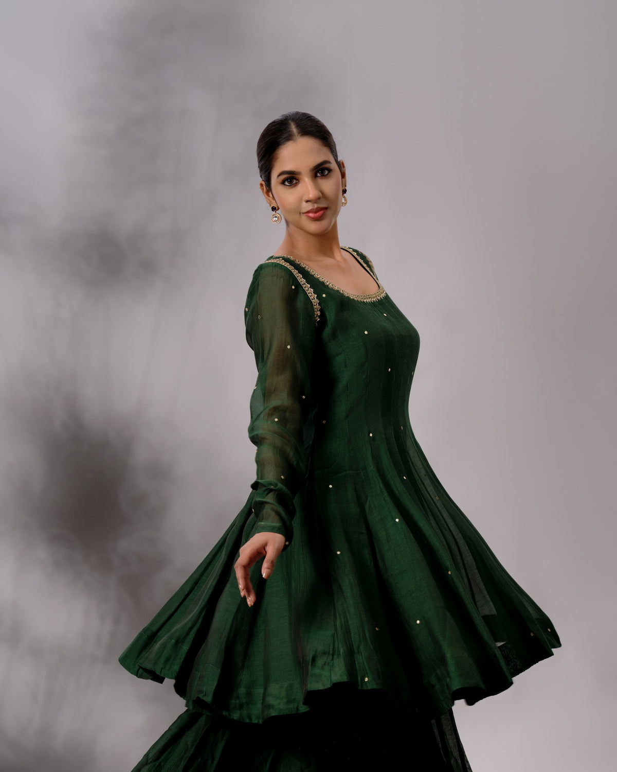 Model wearing the Deep Emerald Panelled Salwar Set by Kpret by Kalakaari