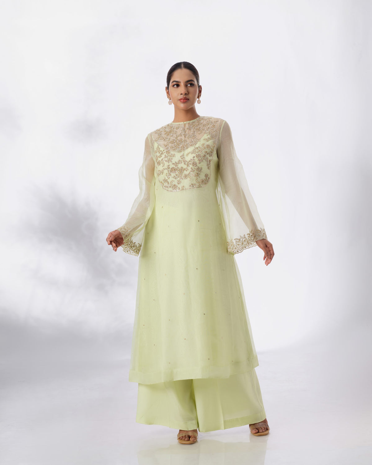 Model wearing the Lime Cream Silk Organza Set by Kpret by Kalakaari