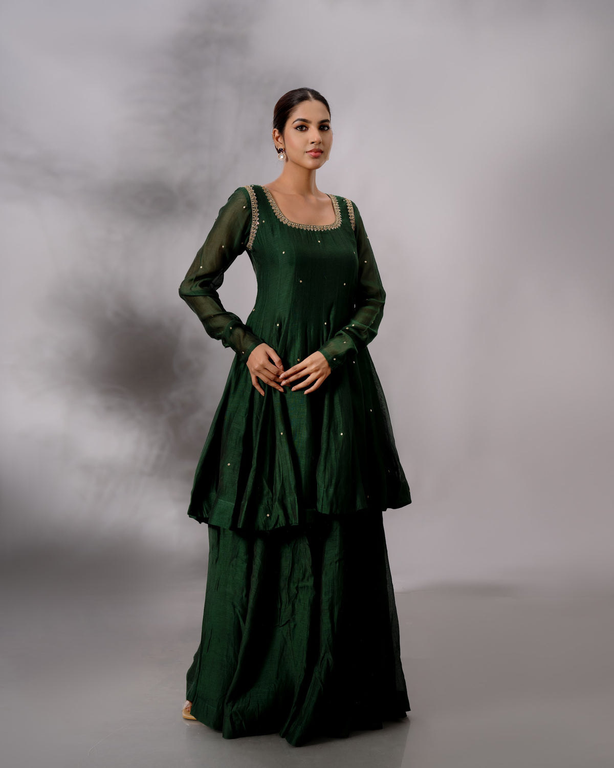 Model wearing the Deep Emerald Panelled Salwar Set by Kpret by Kalakaari