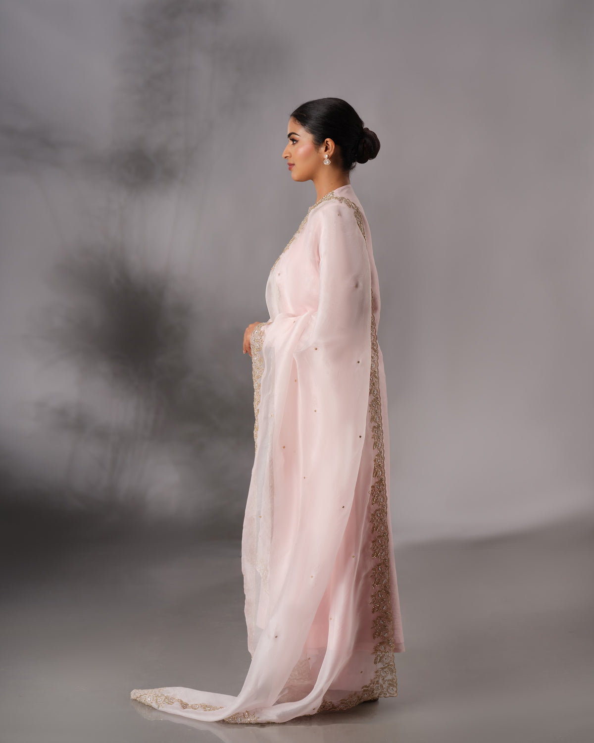 Model wearing the Powder Pink Hand-Embroidered Salwar Set by Kpret by Kalakaari