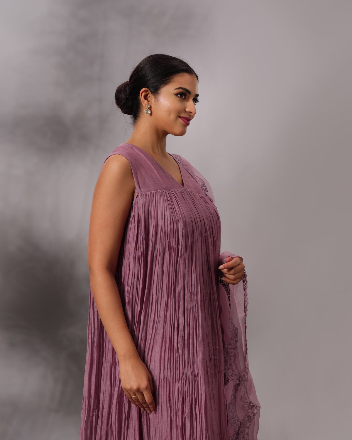Model wearing the Dusty Plum Gathered Salwar Set by Kpret by Kalakaari