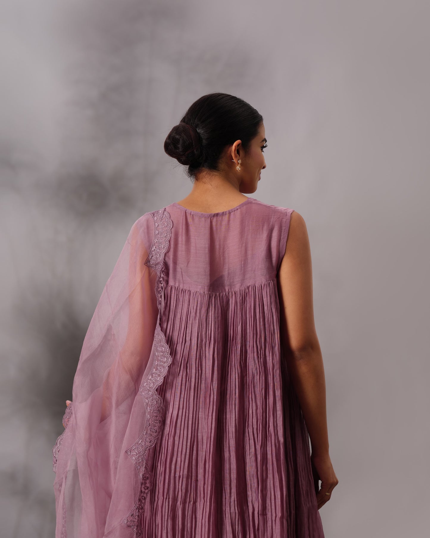 Model wearing the Dusty Plum Gathered Salwar Set by Kpret by Kalakaari