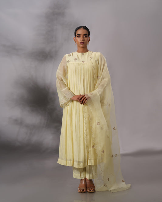 Model wearing the Butter Yellow Gathered Salwar Set by Kpret by Kalakaari