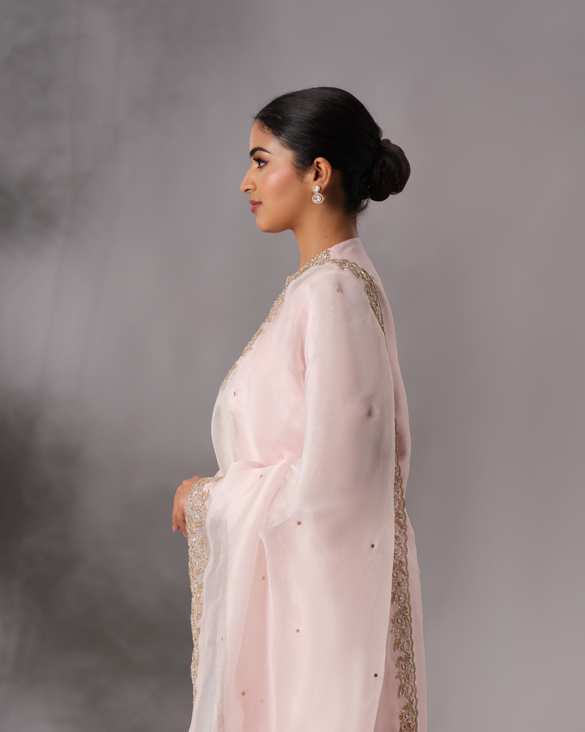 Model wearing the Powder Pink Hand-Embroidered Salwar Set by Kpret by Kalakaari