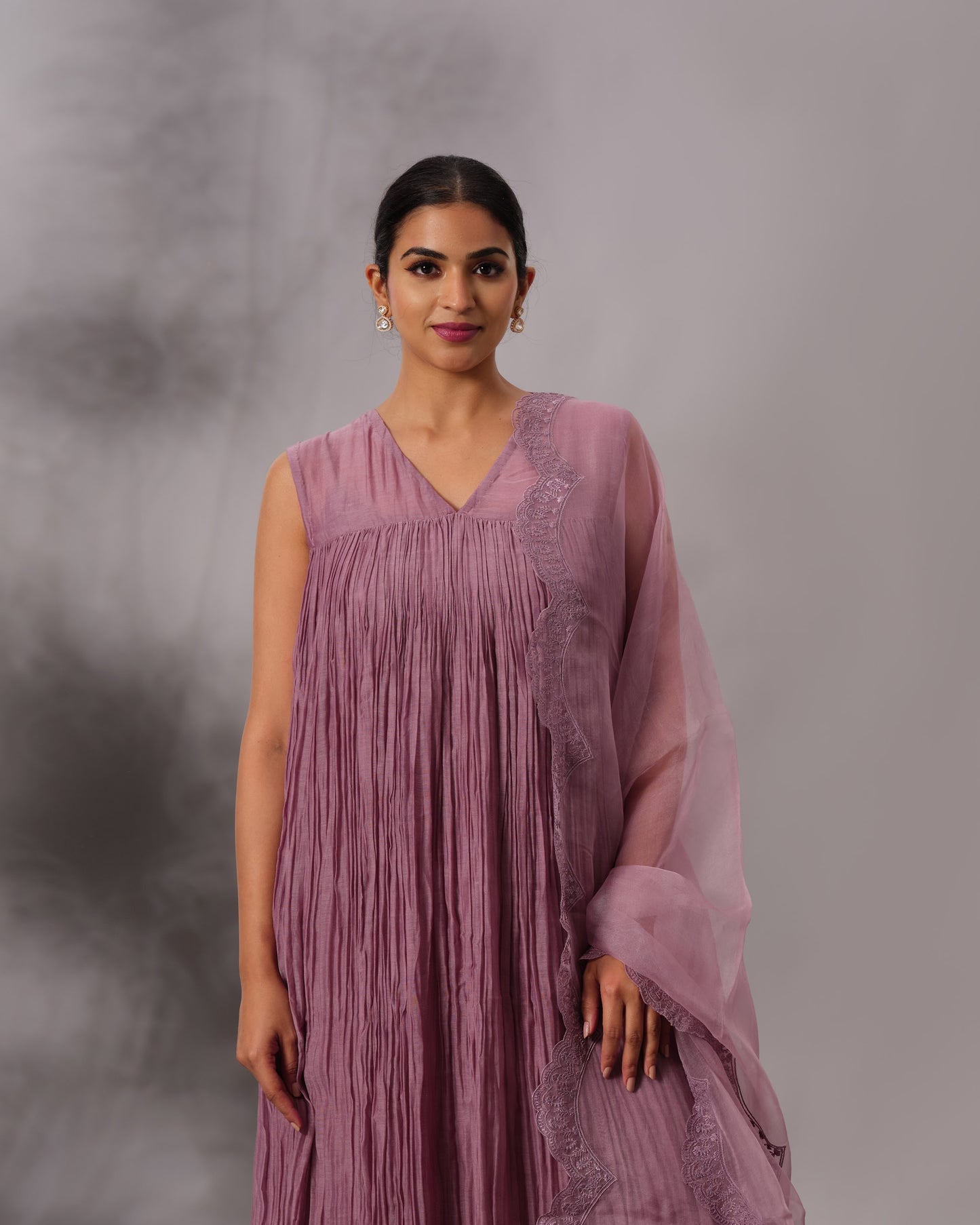 Model wearing the Dusty Plum Gathered Salwar Set by Kpret by Kalakaari