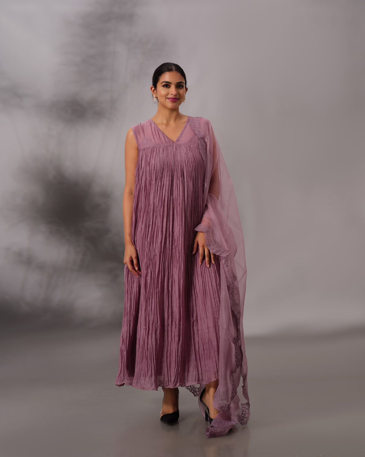 Model wearing the Dusty Plum Gathered Salwar Set by Kpret by Kalakaari