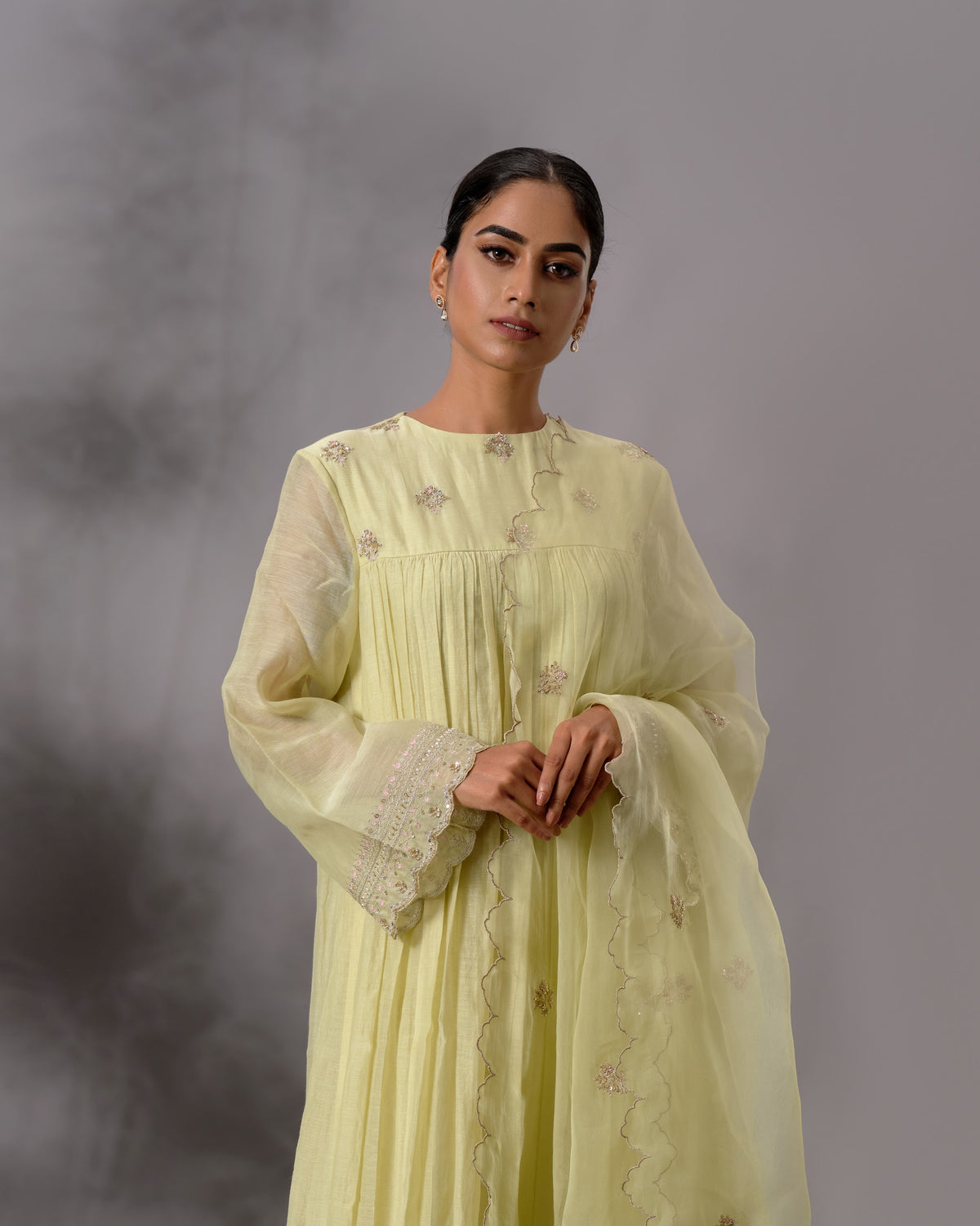 Model wearing the Pale Lime Yellow Gathered Salwar Set by Kpret by Kalakaari