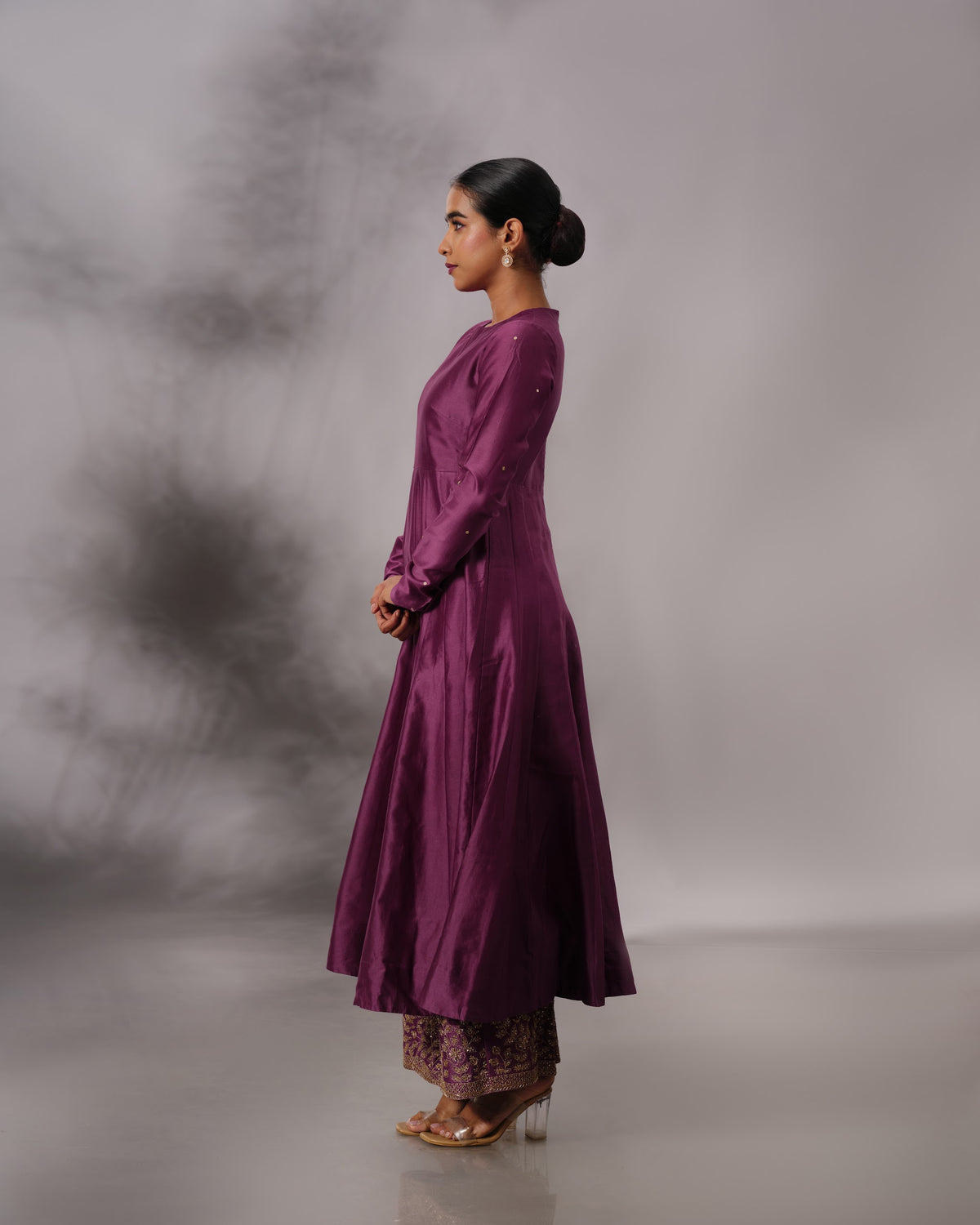 Model wearing the Aubergine Panelled Anarkali Set by Kpret by Kalakaari