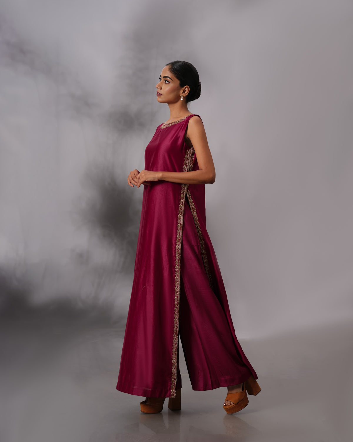 Model wearing the Vintage Wine Side-Slit Salwar Set by Kpret by Kalakaari