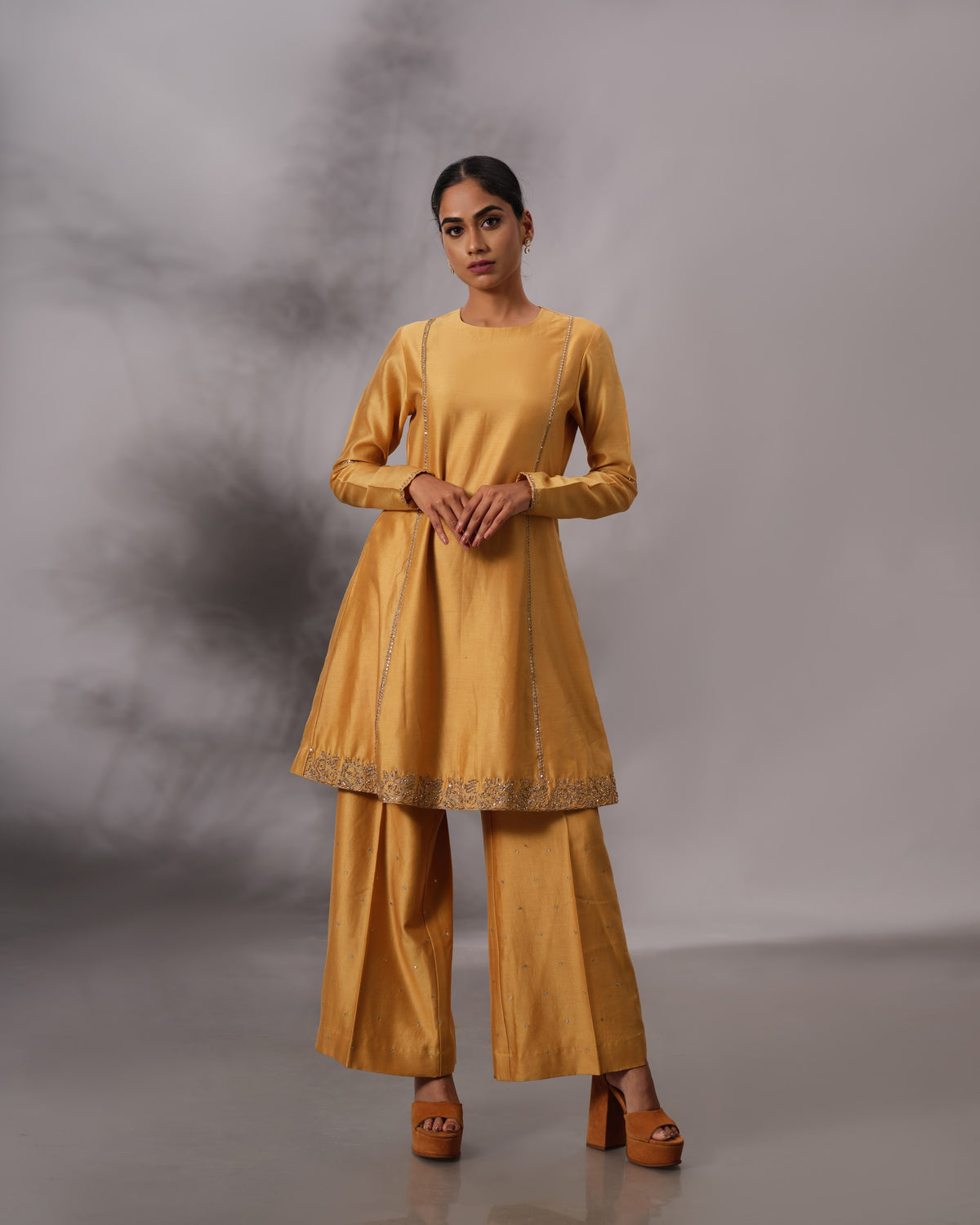 Model wearing the Mustard Yellow Panelled Midi Set by Kpret by Kalakaari