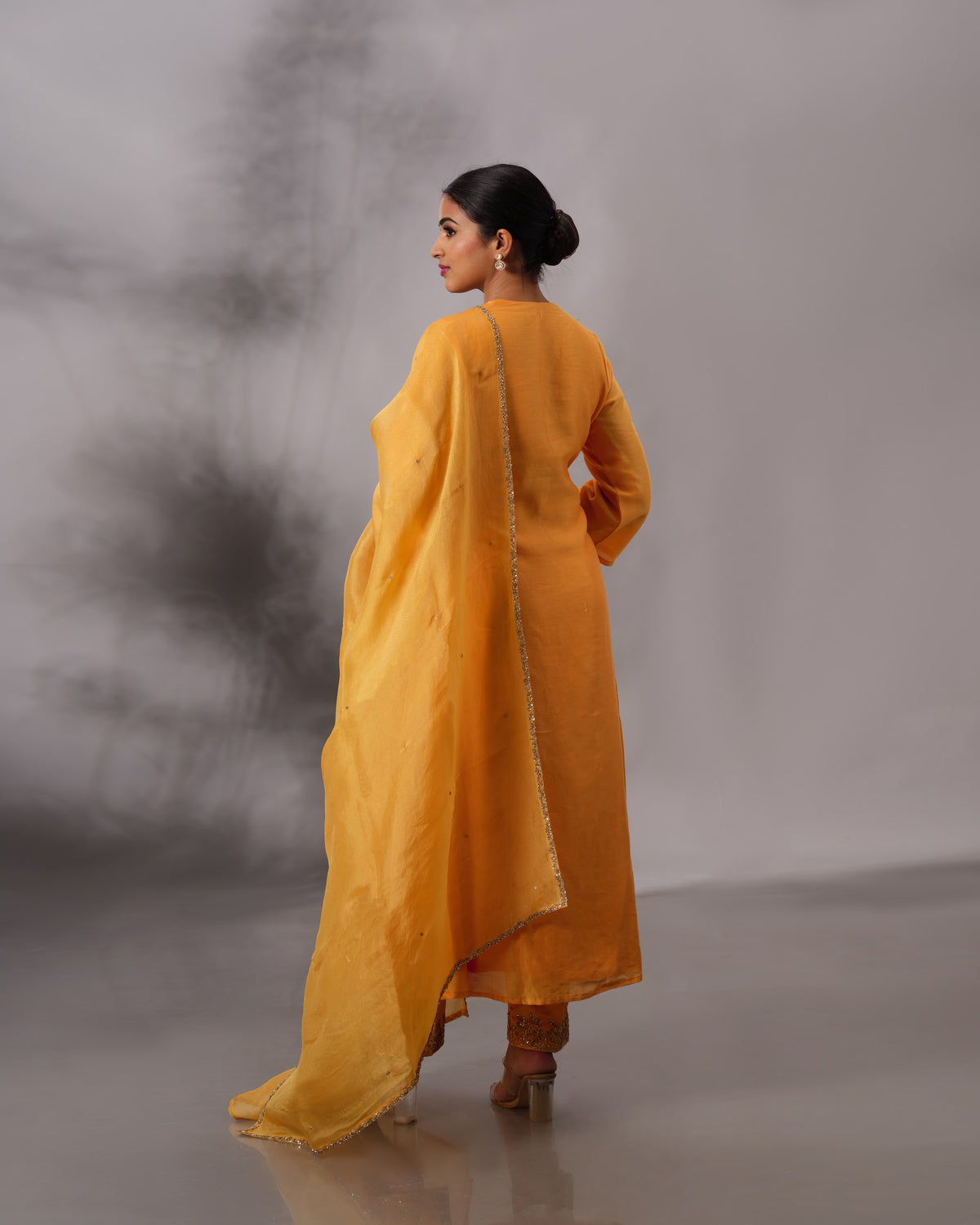 Model wearing the Cadmium Yellow A-Line Chanderi Silk Set by Kpret by Kalakaari