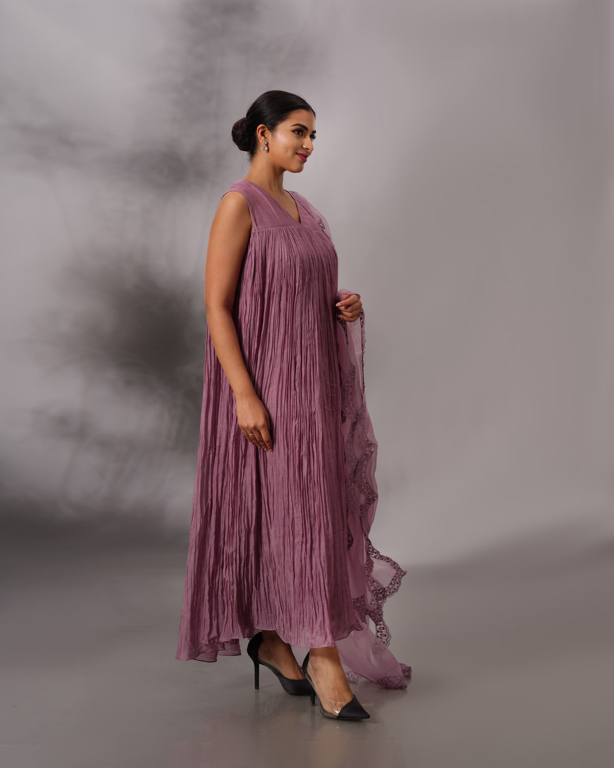 Model wearing the Dusty Plum Gathered Salwar Set by Kpret by Kalakaari