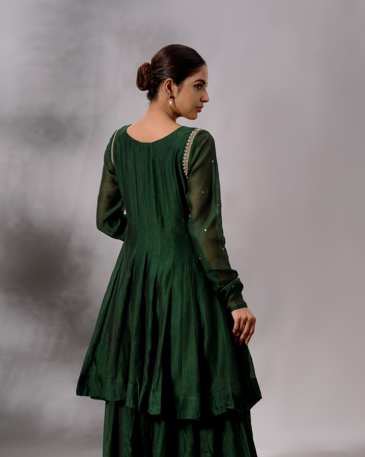 Model wearing the Deep Emerald Panelled Salwar Set by Kpret by Kalakaari