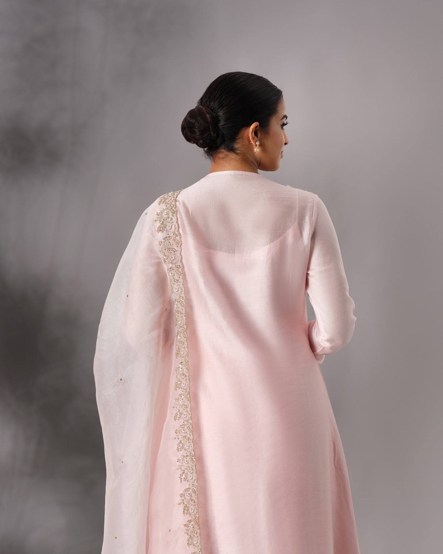 Model wearing the Powder Pink Hand-Embroidered Salwar Set by Kpret by Kalakaari