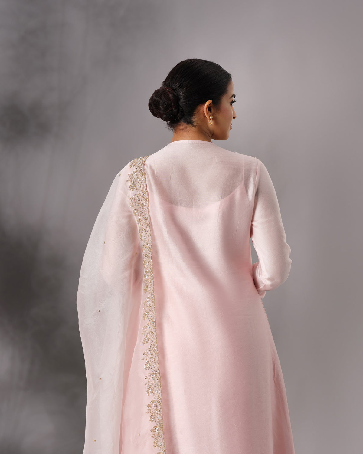 Model wearing the Powder Pink Hand-Embroidered Salwar Set by Kpret by Kalakaari