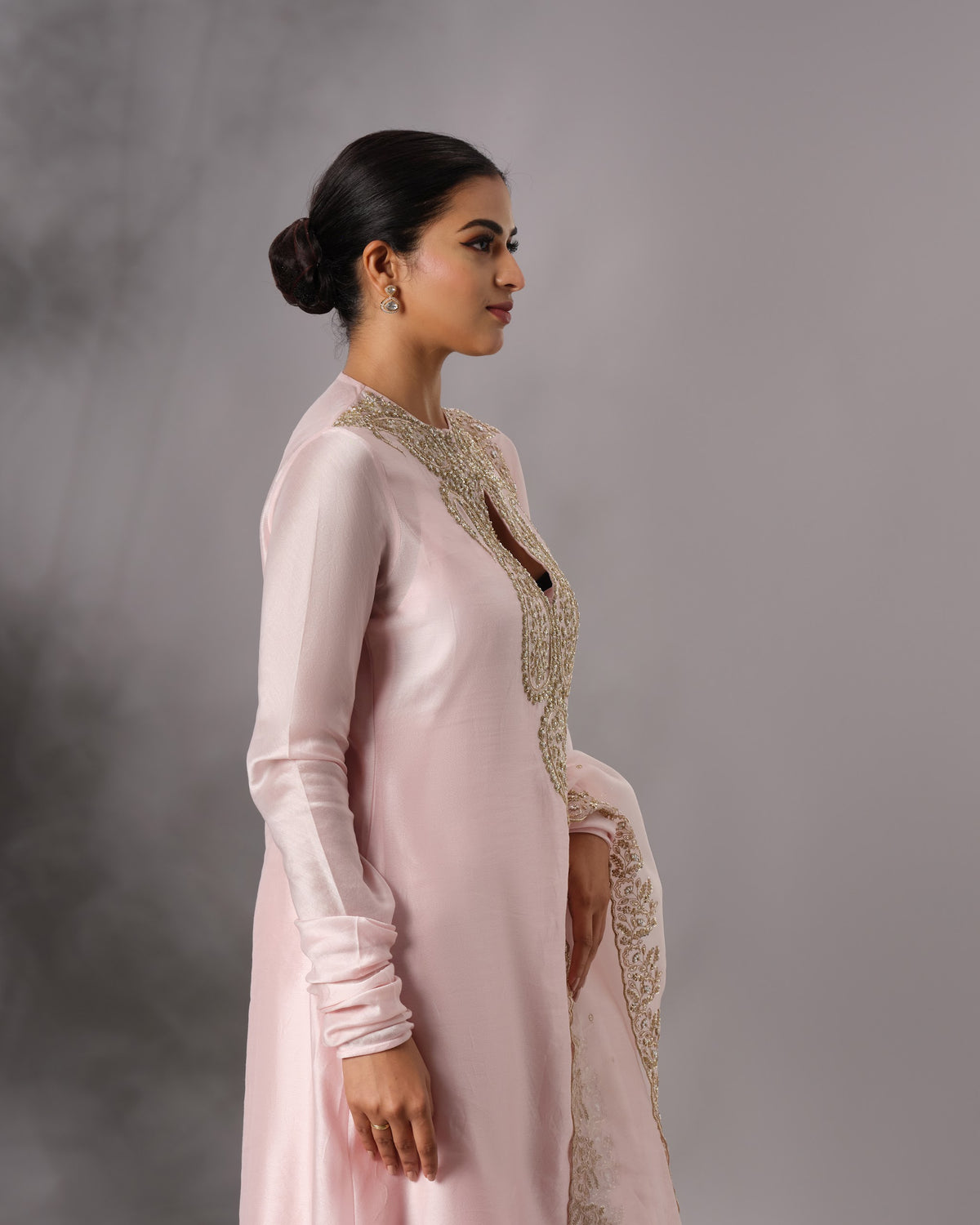 Model wearing the Powder Pink Hand-Embroidered Salwar Set by Kpret by Kalakaari