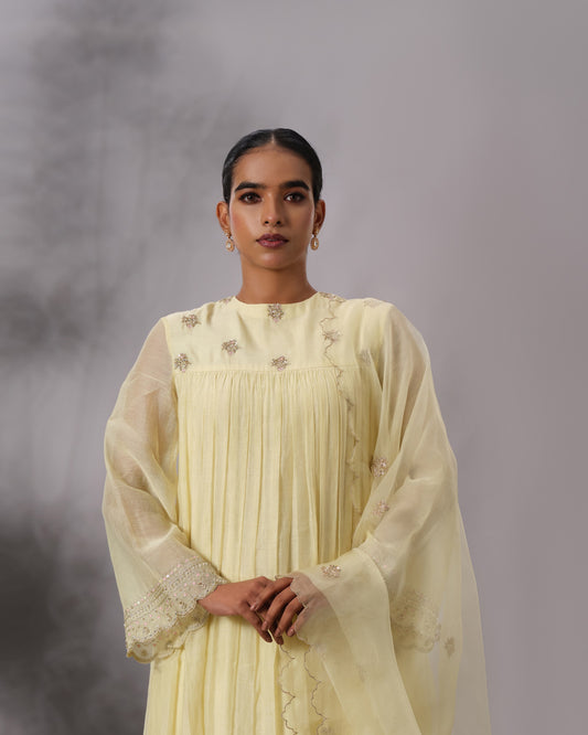Model wearing the Butter Yellow Gathered Salwar Set by Kpret by Kalakaari