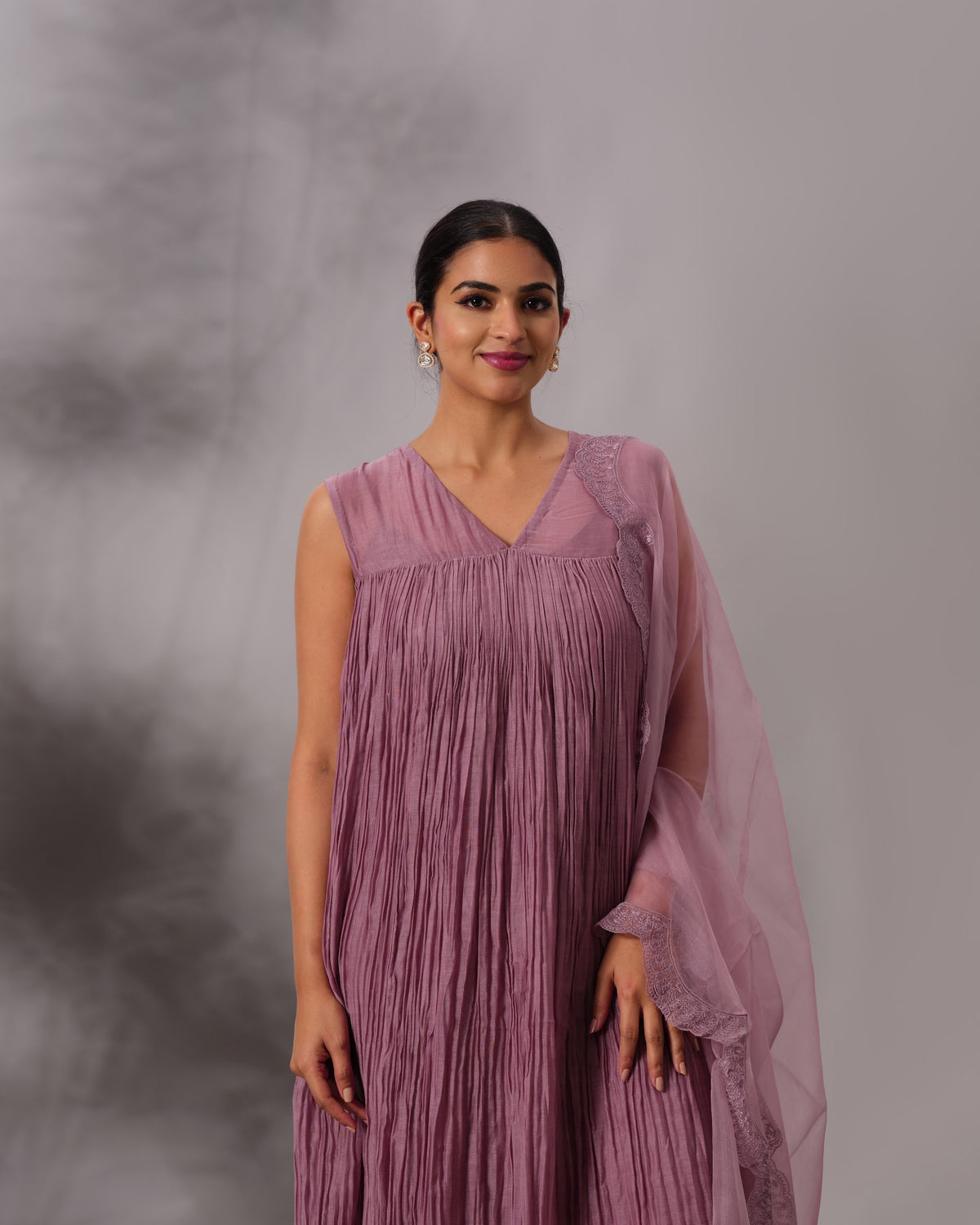 Model wearing the Dusty Plum Gathered Salwar Set by Kpret by Kalakaari