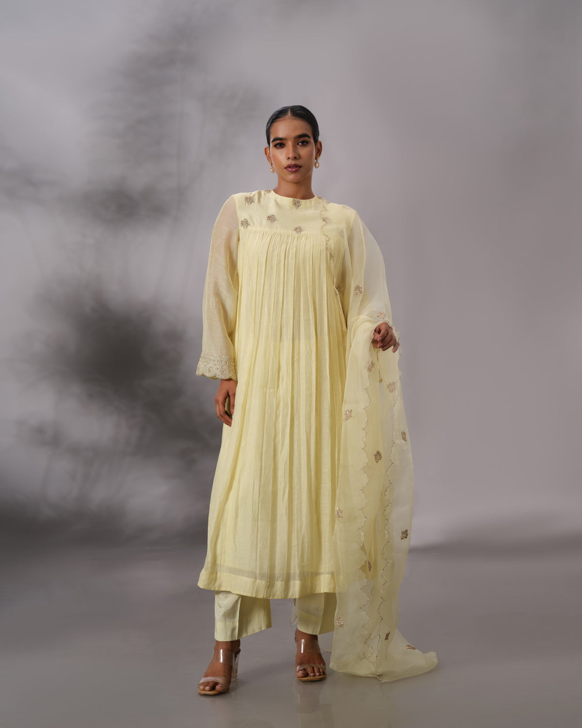 Model wearing the Butter Yellow Gathered Salwar Set by Kpret by Kalakaari