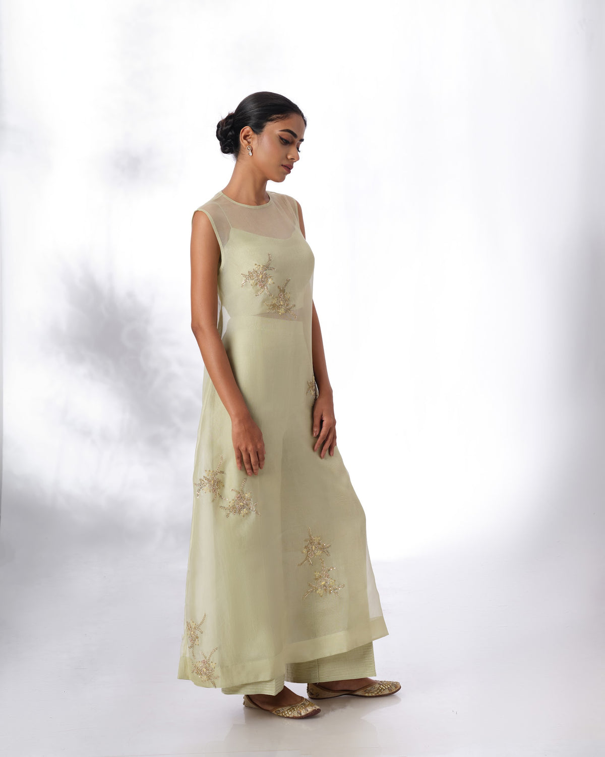 Model wearing the Seafoam Green Silk Organza Butta Set by Kpret by Kalakaari