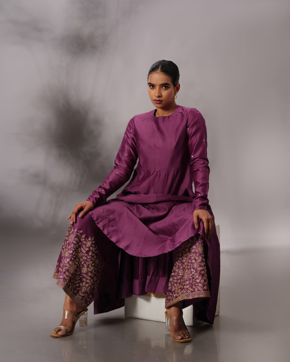 Model wearing the Aubergine Panelled Anarkali Set by Kpret by Kalakaari