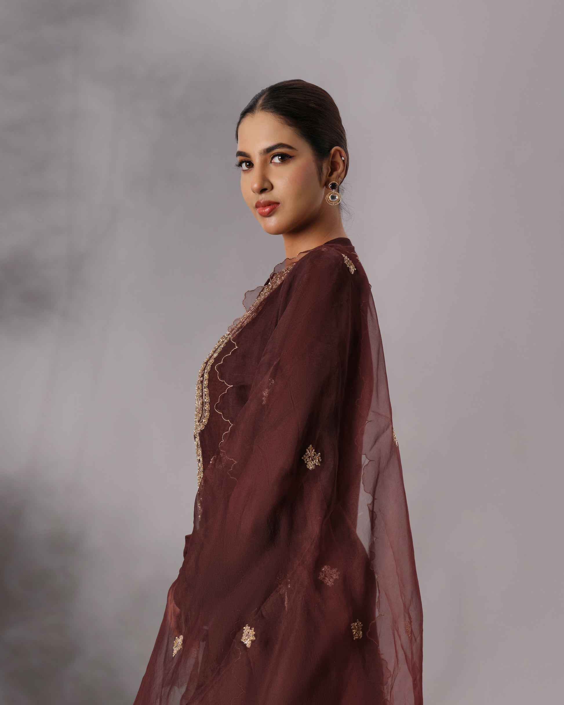 Model wearing the Dark Brown Hand-Embroidered Salwar Set by Kpret by Kalakaari