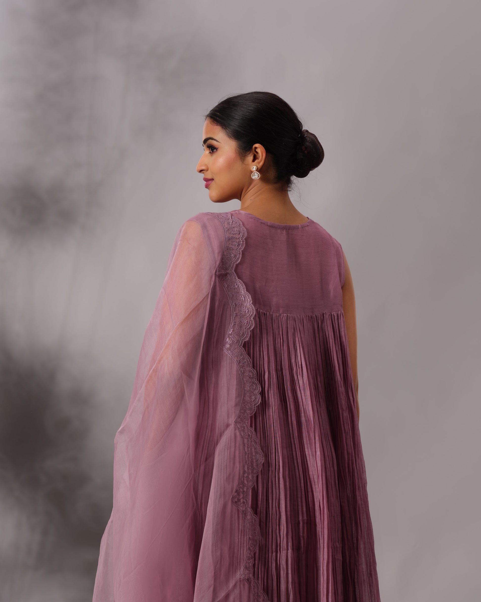 Model wearing the Dusty Plum Gathered Salwar Set by Kpret by Kalakaari
