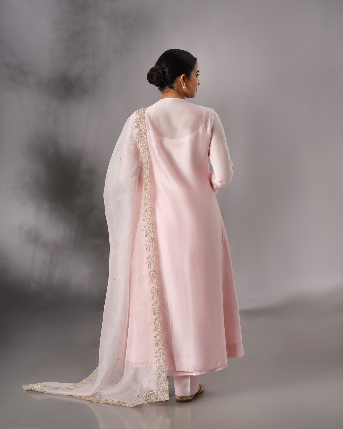 Model wearing the Powder Pink Hand-Embroidered Salwar Set by Kpret by Kalakaari