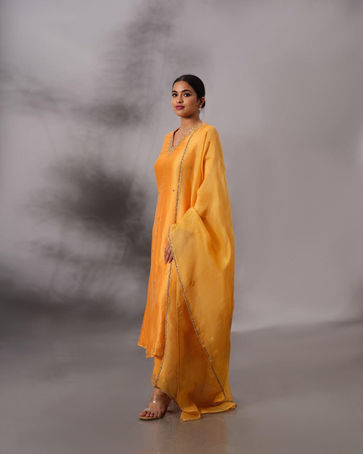 Model wearing the Cadmium Yellow A-Line Chanderi Silk Set by Kpret by Kalakaari