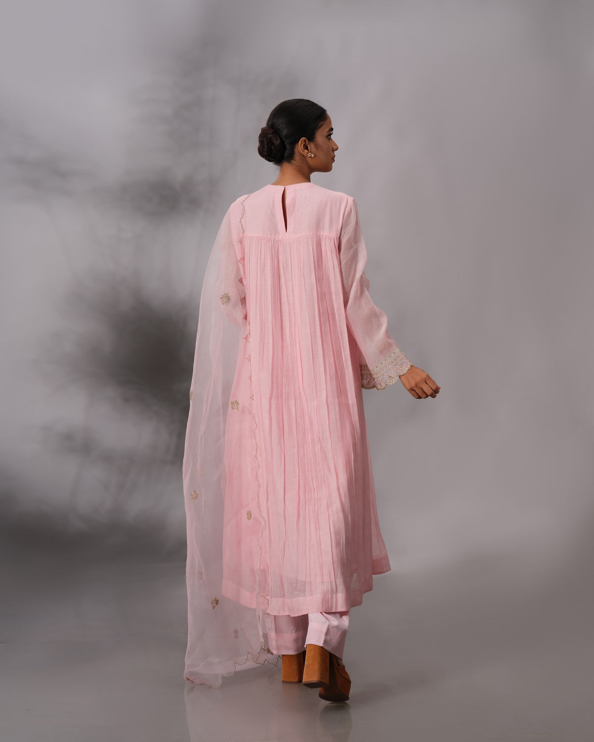 Model wearing the Blush Pink Gathered Salwar Set by Kpret by Kalakaari