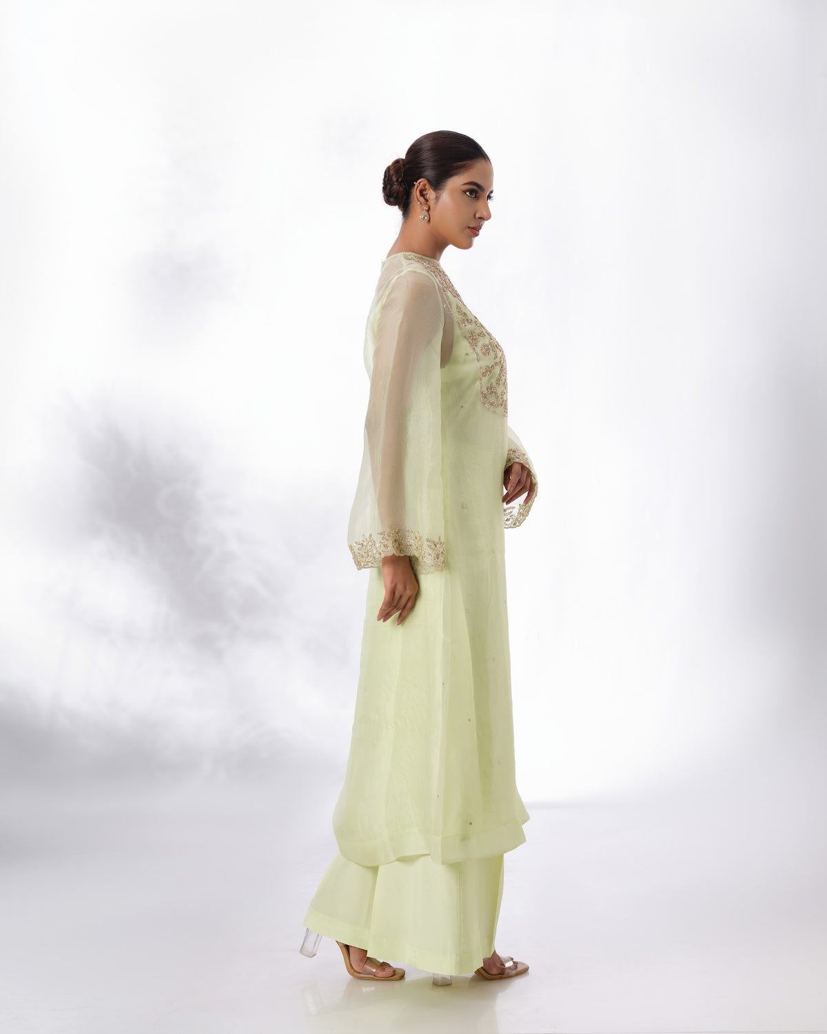 Model wearing the Lime Cream Silk Organza Set by Kpret by Kalakaari