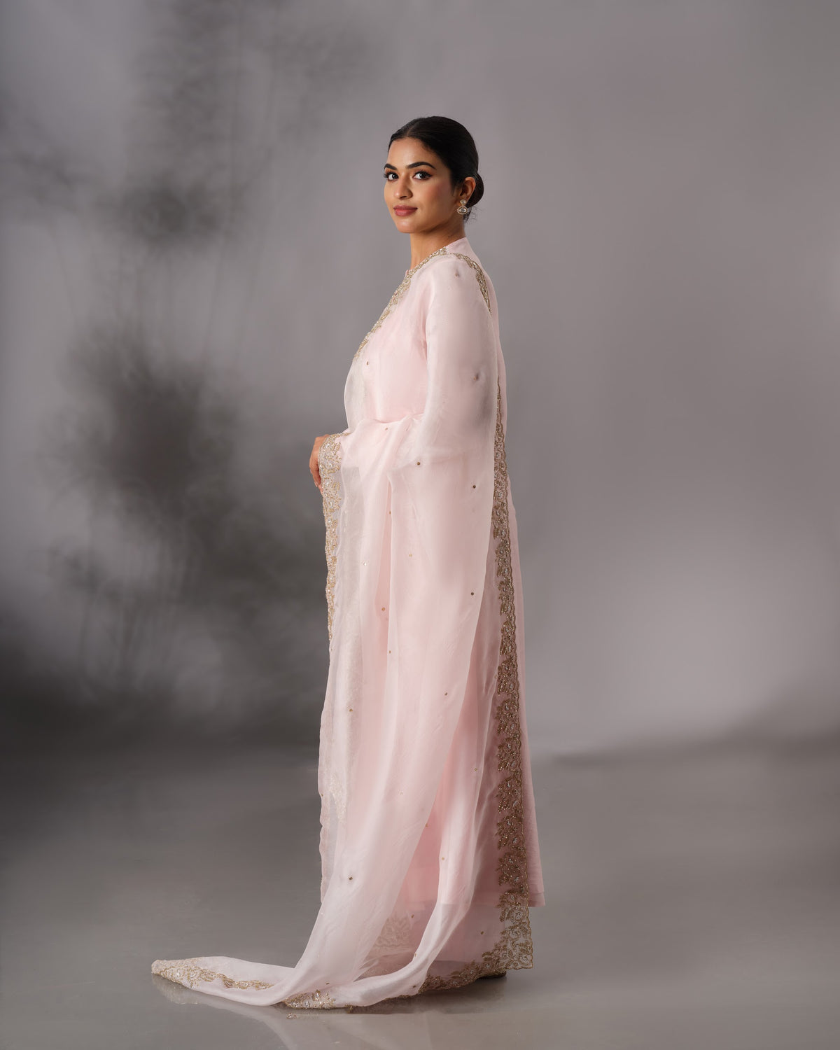 Model wearing the Powder Pink Hand-Embroidered Salwar Set by Kpret by Kalakaari