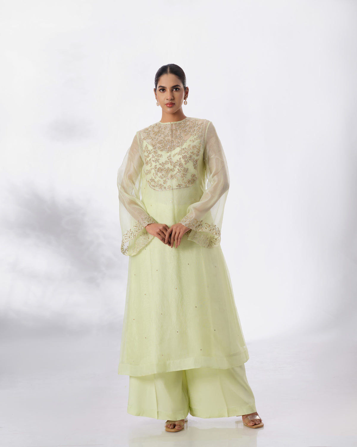 Model wearing the Lime Cream Silk Organza Set by Kpret by Kalakaari