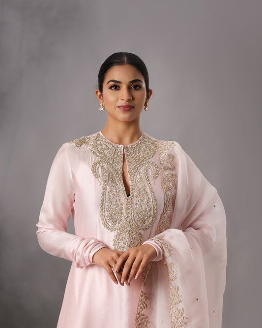 Model wearing the Powder Pink Hand-Embroidered Salwar Set by Kpret by Kalakaari