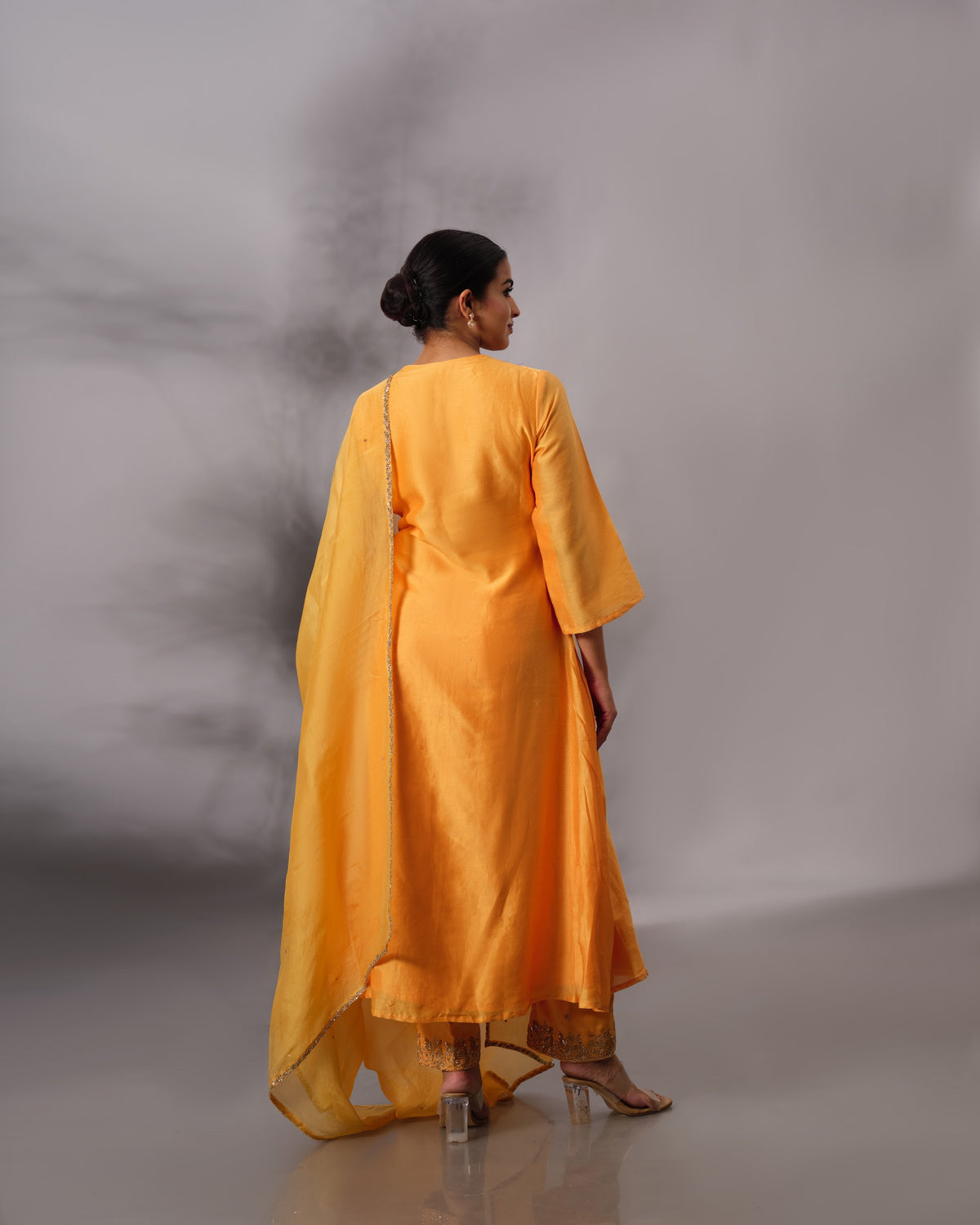 Model wearing the Cadmium Yellow A-Line Chanderi Silk Set by Kpret by Kalakaari