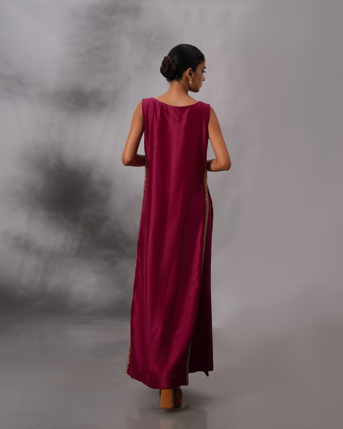 Model wearing the Vintage Wine Side-Slit Salwar Set by Kpret by Kalakaari