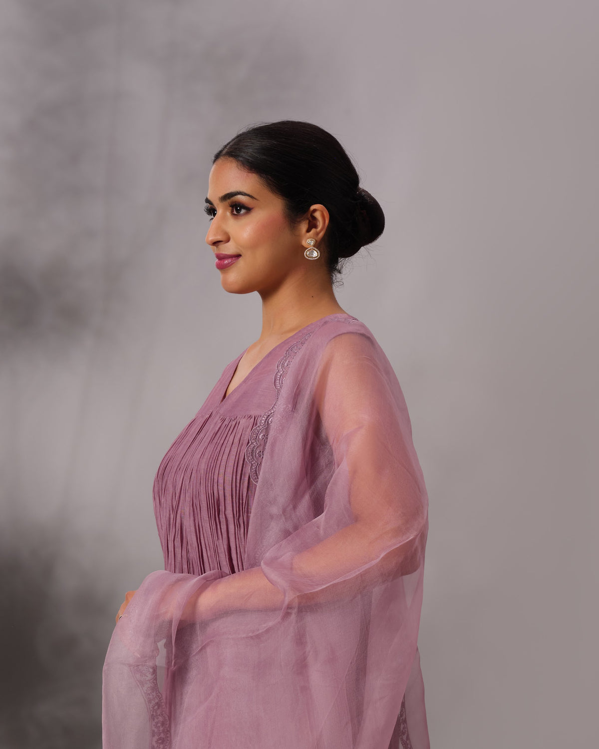 Model wearing the Dusty Plum Gathered Salwar Set by Kpret by Kalakaari