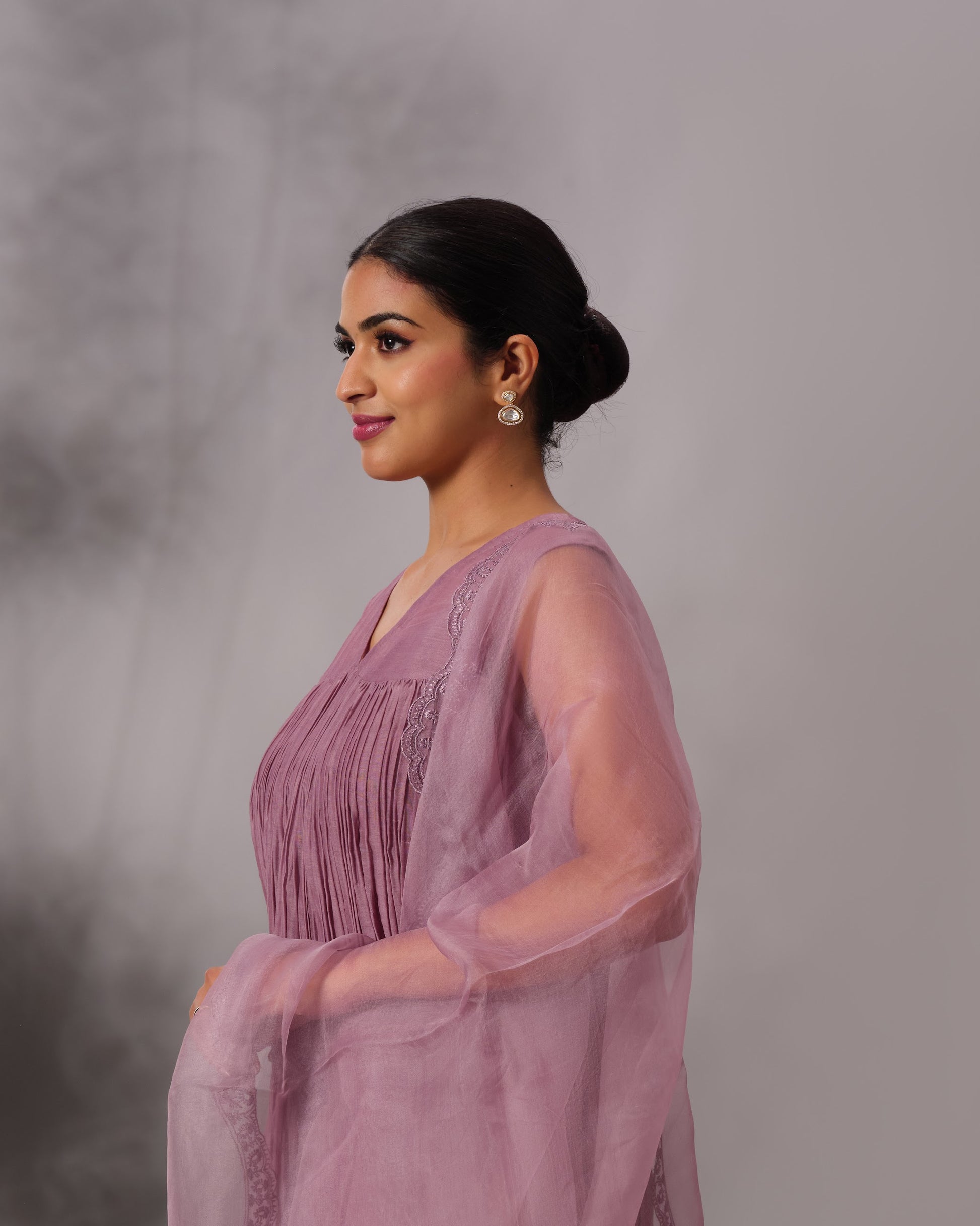 Model wearing the Dusty Plum Gathered Salwar Set by Kpret by Kalakaari