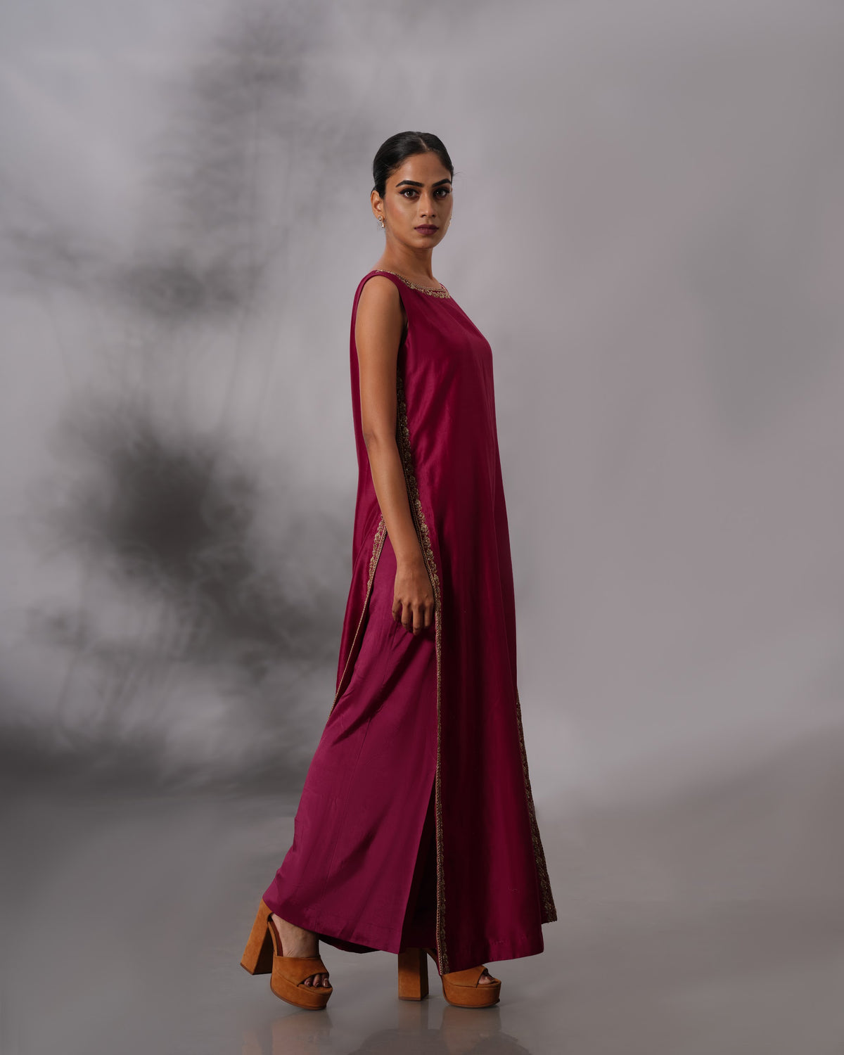 Model wearing the Vintage Wine Side-Slit Salwar Set by Kpret by Kalakaari