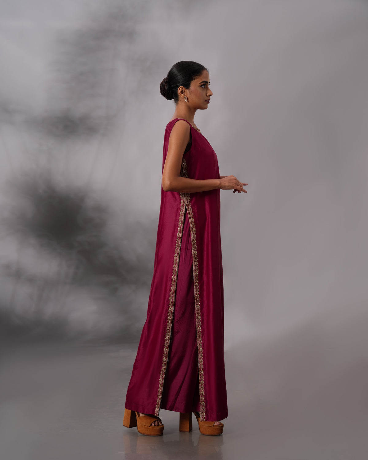 Model wearing the Vintage Wine Side-Slit Salwar Set by Kpret by Kalakaari