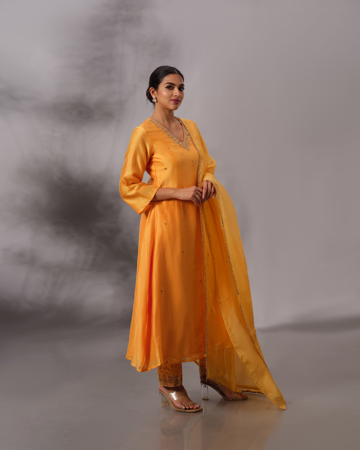 Model wearing the Cadmium Yellow A-Line Chanderi Silk Set by Kpret by Kalakaari