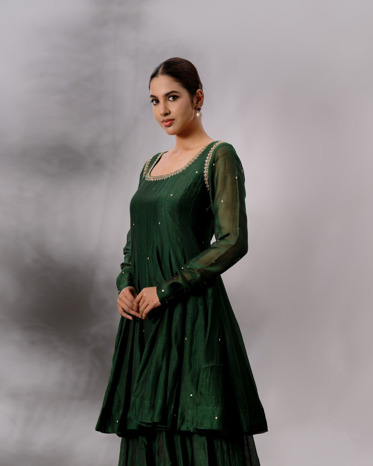 Model wearing the Deep Emerald Panelled Salwar Set by Kpret by Kalakaari