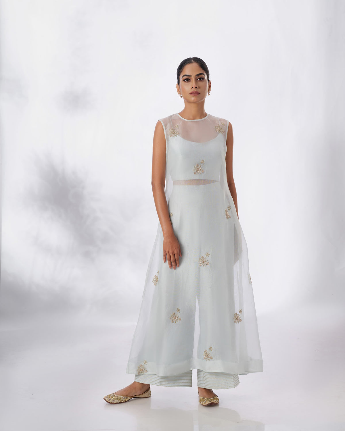 Model wearing the Spa Blue Silk Organza Butta Set by Kpret by Kalakaari