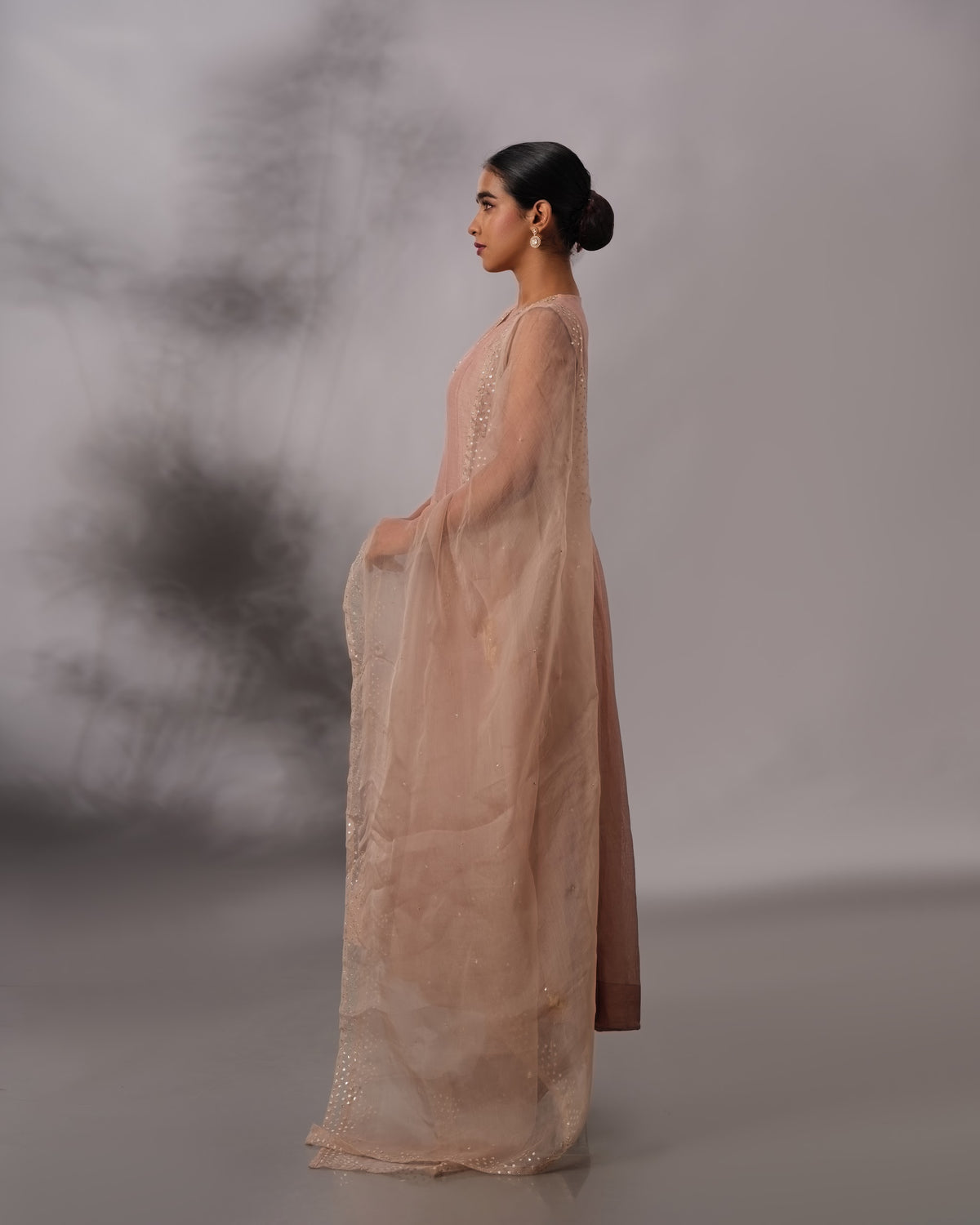 Model wearing the Mocha Mousse Panelled Malai Chanderi Set by Kpret by Kalakaari