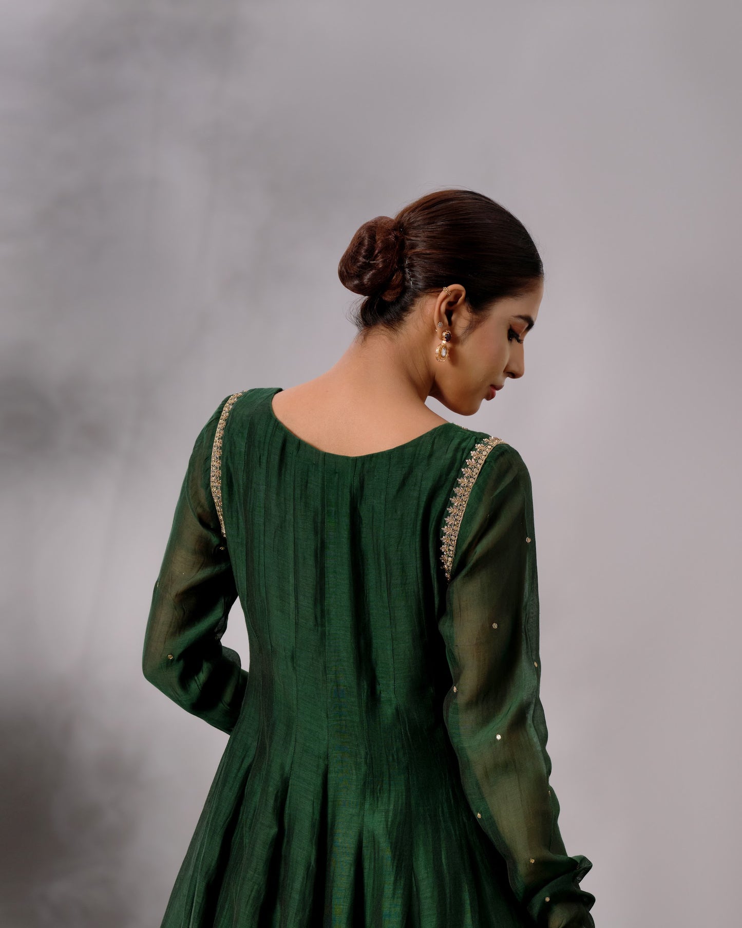 Model wearing the Deep Emerald Panelled Salwar Set by Kpret by Kalakaari