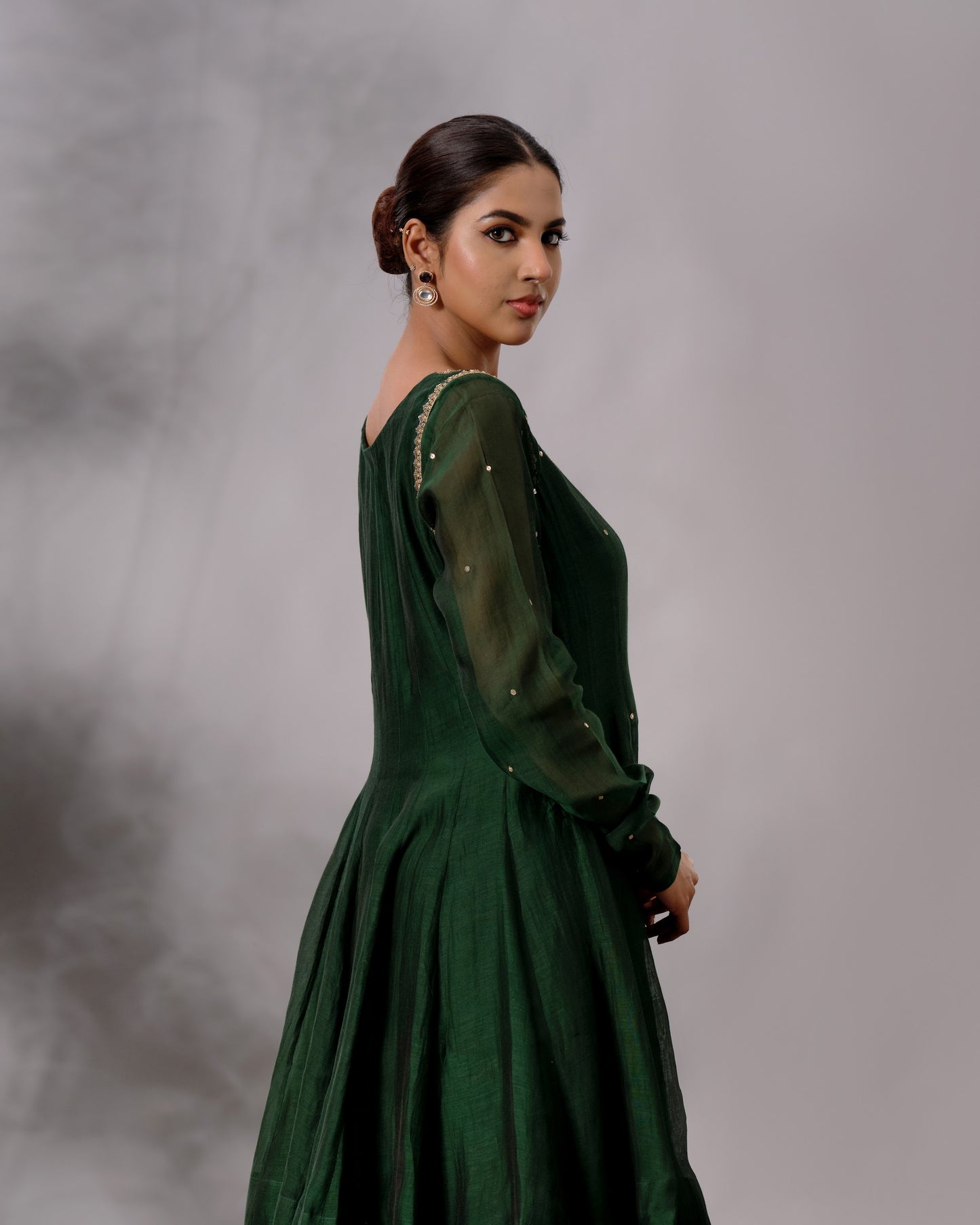 Model wearing the Deep Emerald Panelled Salwar Set by Kpret by Kalakaari