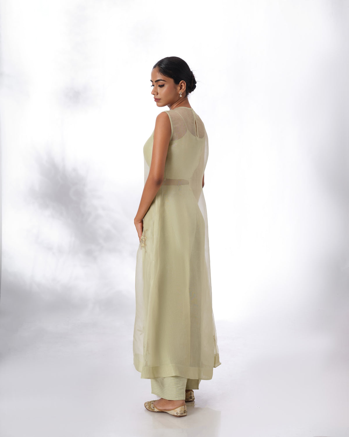 Model wearing the Seafoam Green Silk Organza Butta Set by Kpret by Kalakaari