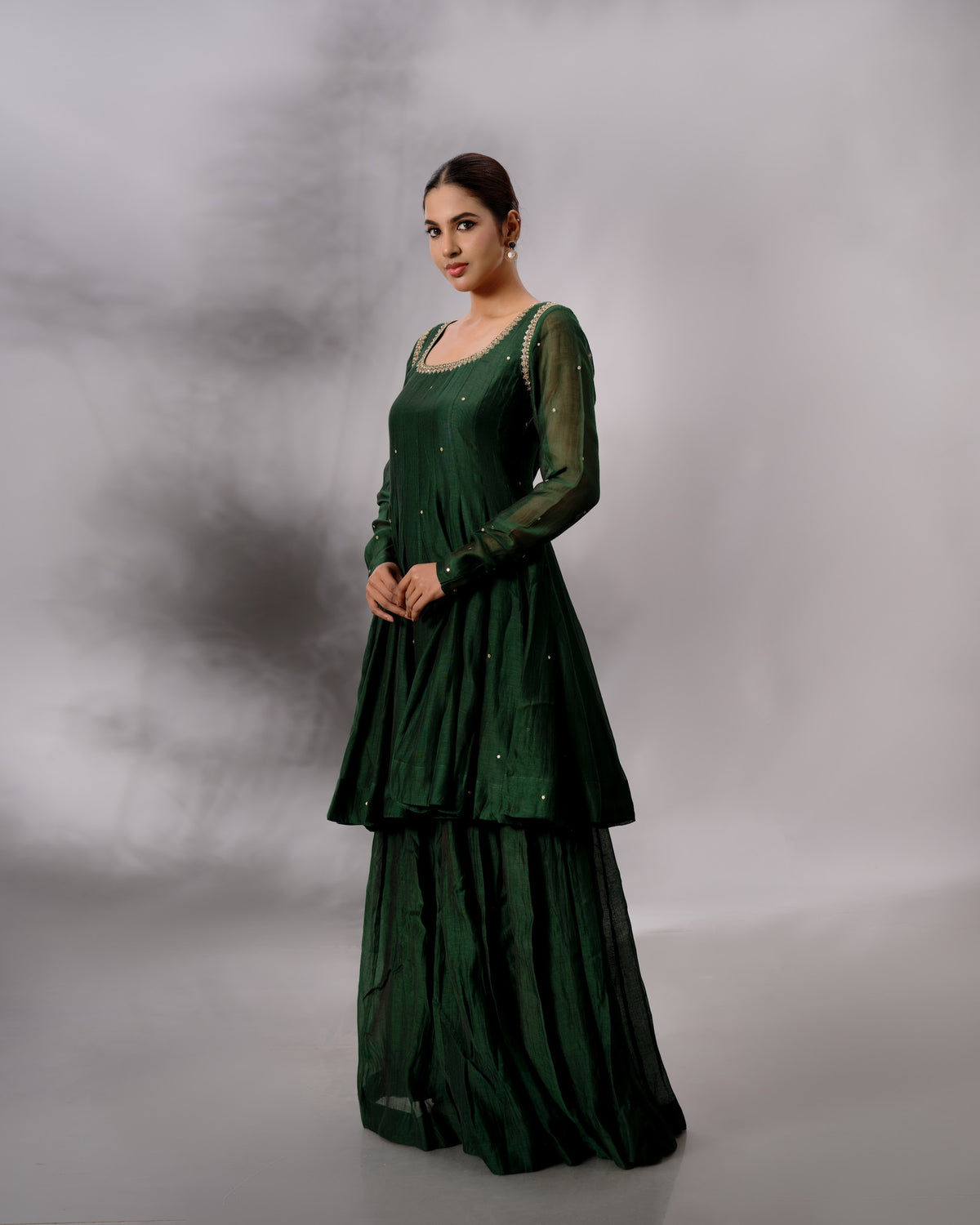 Model wearing the Deep Emerald Panelled Salwar Set by Kpret by Kalakaari